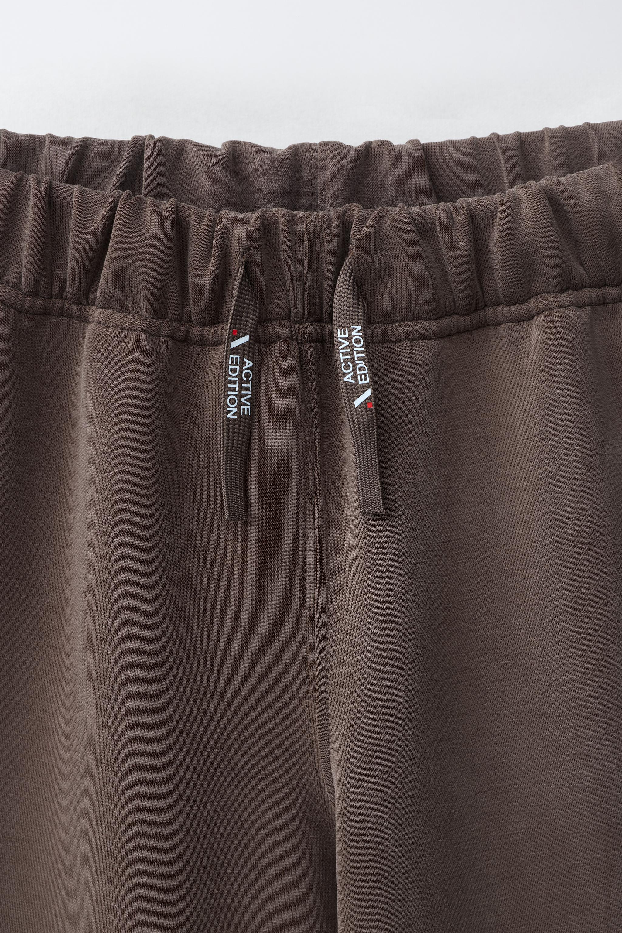 SPORTY CONTRAST PIPING TROUSERS